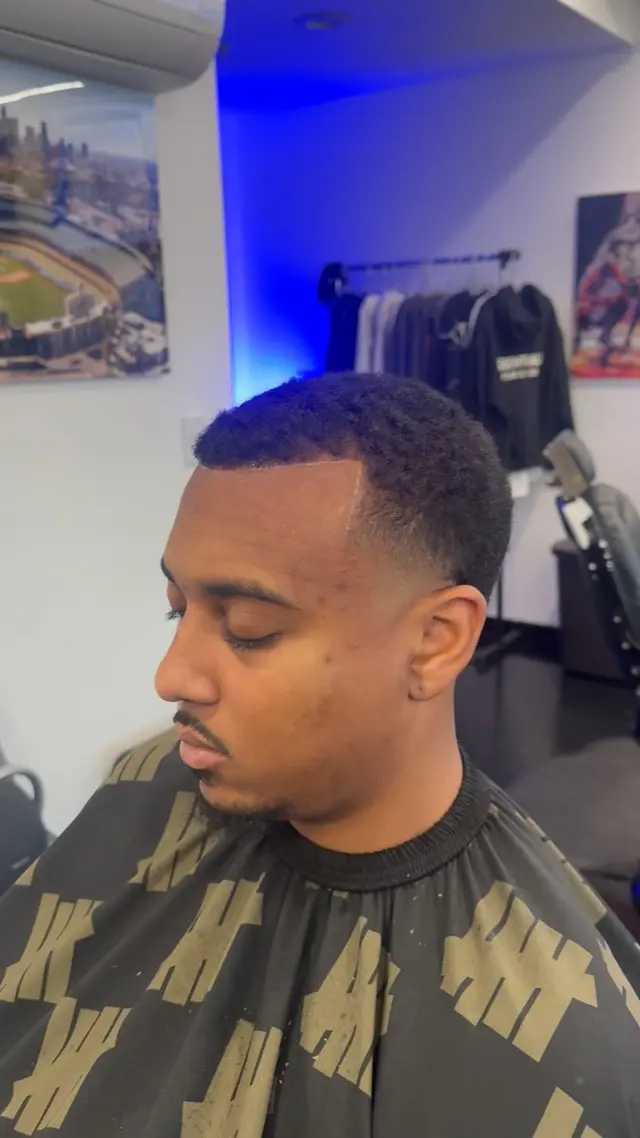 Client with a fresh taper and lineup at Ocean Park Barbershop