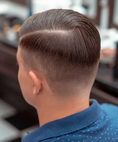 Finished classic side part haircut with a clean taper